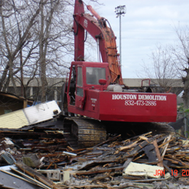 Excavator Over Rubble 