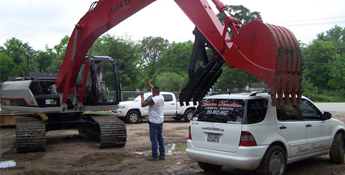 Excavator and a Work Car